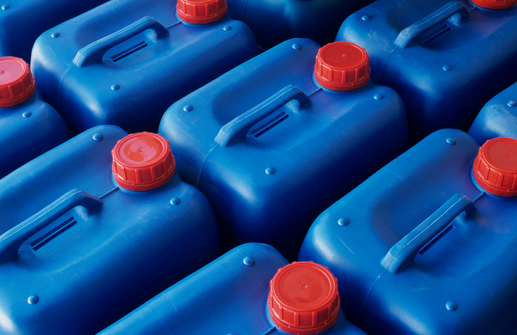 Plastic jerry cans in Plastics factory, Spain, close-up, elevated view